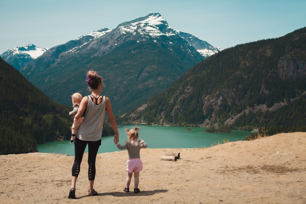 a mother with her 2 kids traveling 